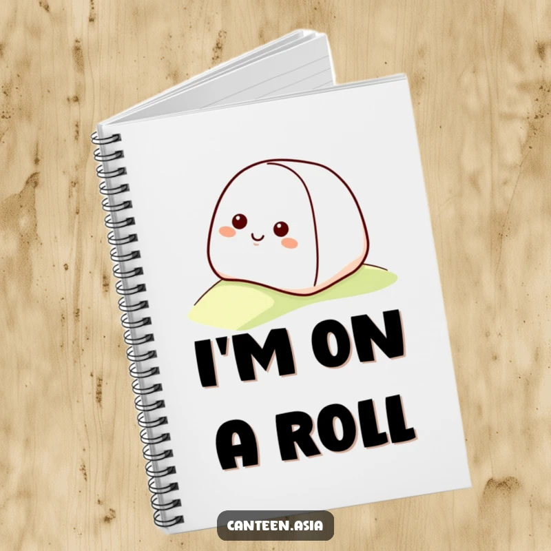 Funny onigiri notebook with a smiling onigiri with a happy face rolling down a gentle slope.